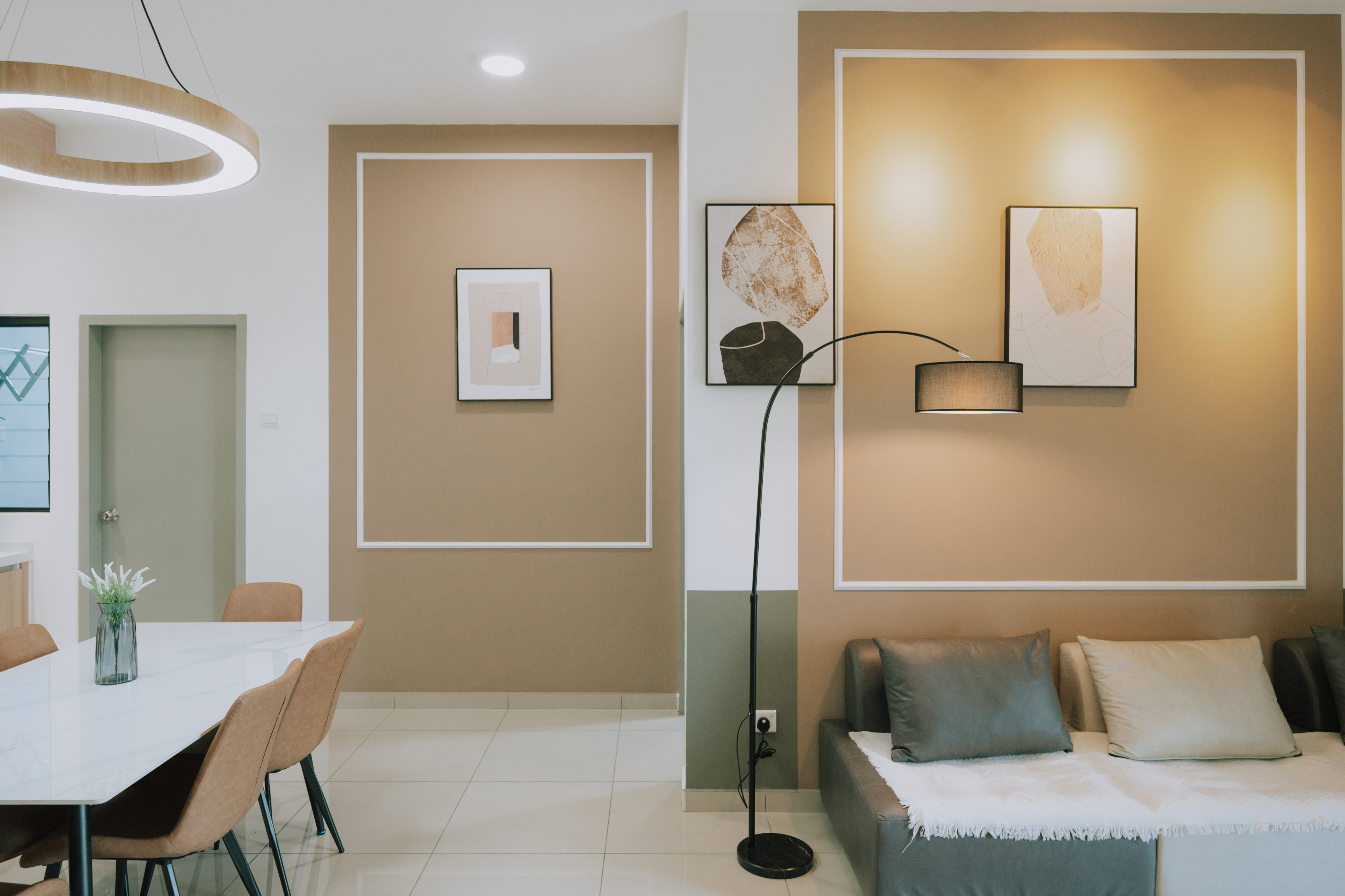 Parkland Residence dining and living area — feature frame walls, pendant light
