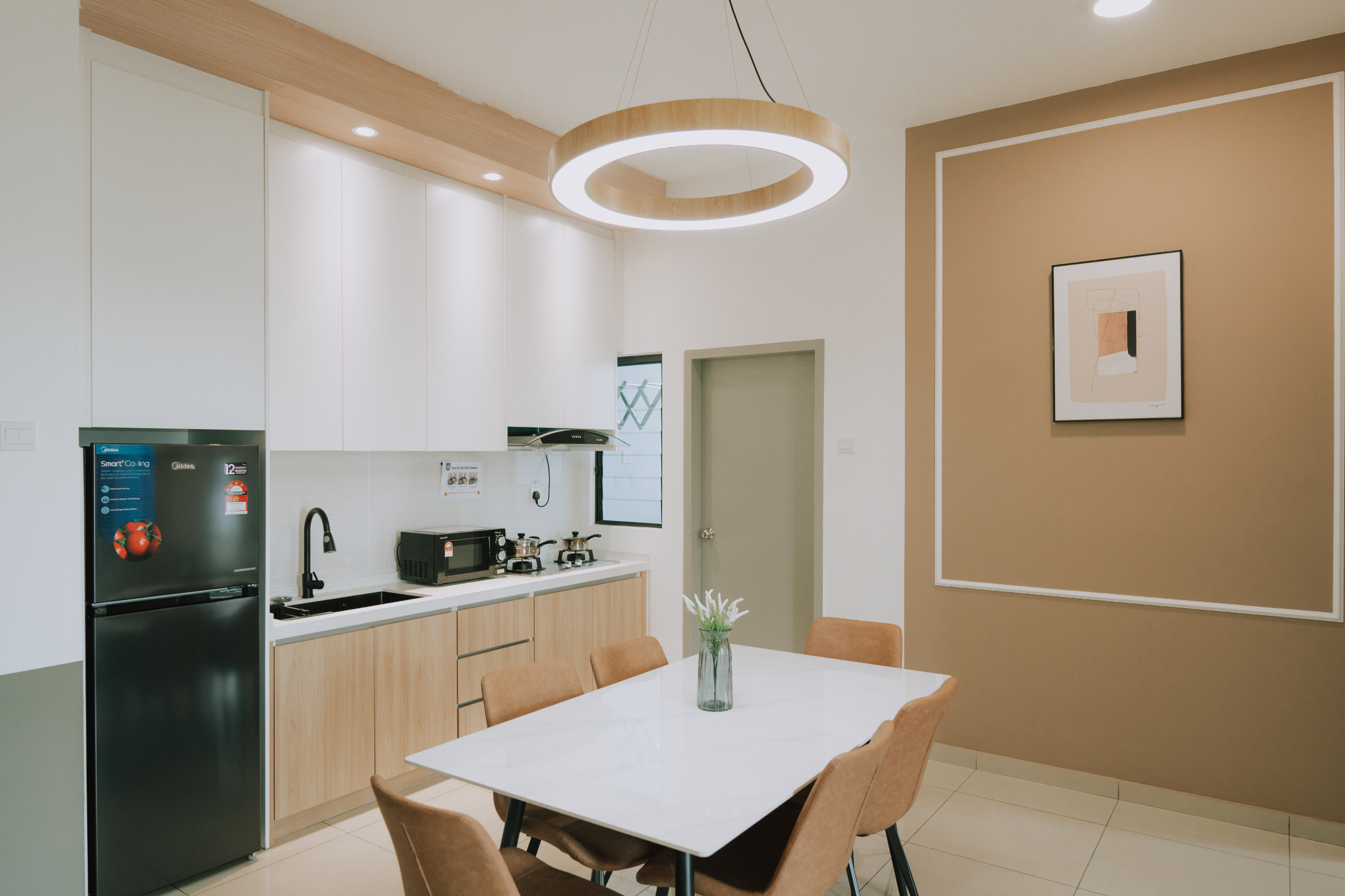 Parkland Residence kitchen — clean white cabinetry, open plan